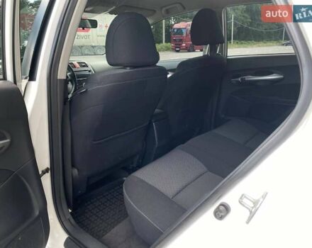 Белый Тойота Аурис, объемом двигателя 1.36 л и пробегом 265 тыс. км за 7790 $, фото 19 на Automoto.ua