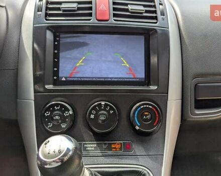 Белый Тойота Аурис, объемом двигателя 1.36 л и пробегом 277 тыс. км за 7500 $, фото 40 на Automoto.ua