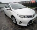 Белый Тойота Аурис, объемом двигателя 1.36 л и пробегом 246 тыс. км за 8100 $, фото 1 на Automoto.ua