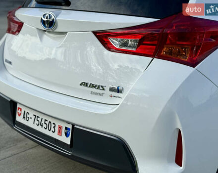 Білий Тойота Ауріс, об'ємом двигуна 1.8 л та пробігом 215 тис. км за 13500 $, фото 12 на Automoto.ua