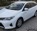 Белый Тойота Аурис, объемом двигателя 1.4 л и пробегом 185 тыс. км за 10600 $, фото 1 на Automoto.ua