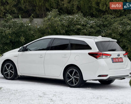 Белый Тойота Аурис, объемом двигателя 1.8 л и пробегом 200 тыс. км за 15700 $, фото 4 на Automoto.ua