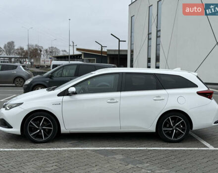 Белый Тойота Аурис, объемом двигателя 1.8 л и пробегом 200 тыс. км за 15900 $, фото 2 на Automoto.ua