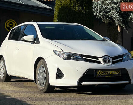 Білий Тойота Ауріс, об'ємом двигуна 1.36 л та пробігом 103 тис. км за 9200 $, фото 1 на Automoto.ua