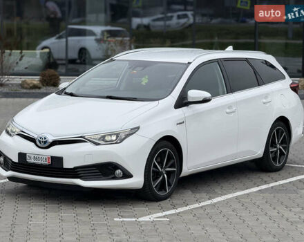 Белый Тойота Аурис, объемом двигателя 1.8 л и пробегом 200 тыс. км за 15700 $, фото 1 на Automoto.ua