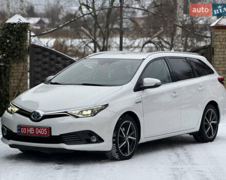 Белый Тойота Аурис, объемом двигателя 1.8 л и пробегом 200 тыс. км за 15700 $, фото 1 на Automoto.ua