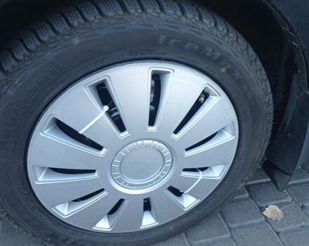 Черный Тойота Аурис, объемом двигателя 1.6 л и пробегом 236 тыс. км за 5900 $, фото 6 на Automoto.ua