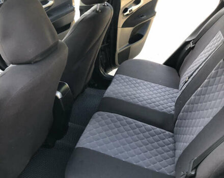 Черный Тойота Аурис, объемом двигателя 1.4 л и пробегом 272 тыс. км за 5900 $, фото 23 на Automoto.ua