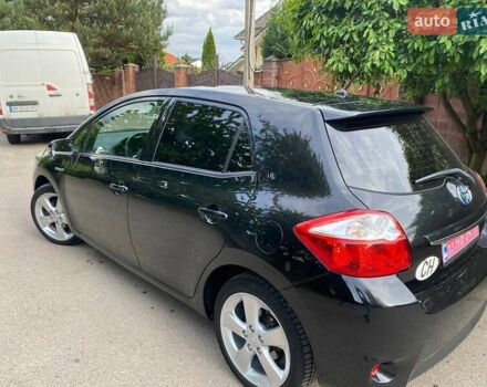 Чорний Тойота Ауріс, об'ємом двигуна 1.8 л та пробігом 235 тис. км за 10500 $, фото 6 на Automoto.ua