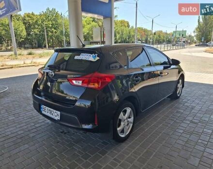 Чорний Тойота Ауріс, об'ємом двигуна 1.33 л та пробігом 129 тис. км за 9300 $, фото 6 на Automoto.ua