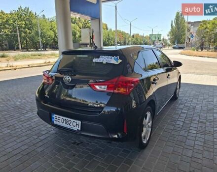 Чорний Тойота Ауріс, об'ємом двигуна 1.33 л та пробігом 129 тис. км за 9300 $, фото 7 на Automoto.ua