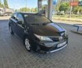 Чорний Тойота Ауріс, об'ємом двигуна 1.33 л та пробігом 129 тис. км за 9300 $, фото 4 на Automoto.ua