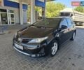 Чорний Тойота Ауріс, об'ємом двигуна 1.33 л та пробігом 129 тис. км за 9300 $, фото 1 на Automoto.ua