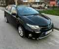 Черный Тойота Аурис, объемом двигателя 1.8 л и пробегом 269 тыс. км за 11500 $, фото 1 на Automoto.ua