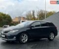 Чорний Тойота Ауріс, об'ємом двигуна 2 л та пробігом 234 тис. км за 9999 $, фото 1 на Automoto.ua