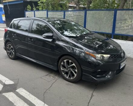 Чорний Тойота Ауріс, об'ємом двигуна 1.8 л та пробігом 122 тис. км за 13600 $, фото 1 на Automoto.ua