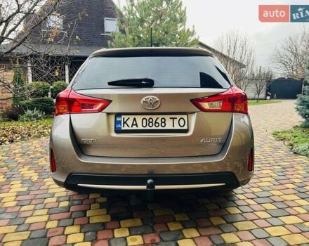 Коричневий Тойота Ауріс, об'ємом двигуна 1.36 л та пробігом 196 тис. км за 8999 $, фото 6 на Automoto.ua