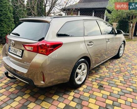 Коричневий Тойота Ауріс, об'ємом двигуна 1.36 л та пробігом 196 тис. км за 8999 $, фото 7 на Automoto.ua