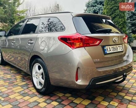 Коричневий Тойота Ауріс, об'ємом двигуна 1.36 л та пробігом 196 тис. км за 8999 $, фото 5 на Automoto.ua