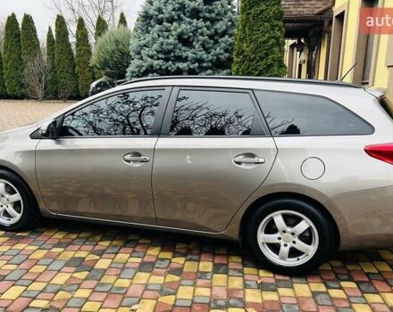 Коричневий Тойота Ауріс, об'ємом двигуна 1.36 л та пробігом 196 тис. км за 8999 $, фото 4 на Automoto.ua