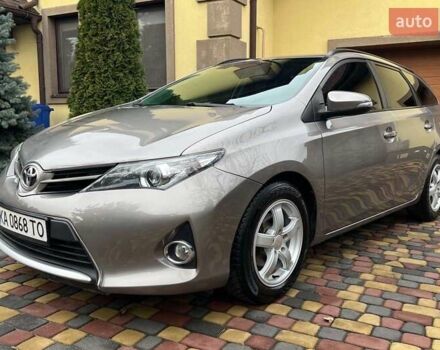 Коричневий Тойота Ауріс, об'ємом двигуна 1.36 л та пробігом 196 тис. км за 8999 $, фото 3 на Automoto.ua