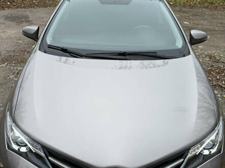 Коричневый Тойота Аурис, объемом двигателя 1.33 л и пробегом 105 тыс. км за 9800 $, фото 1 на Automoto.ua