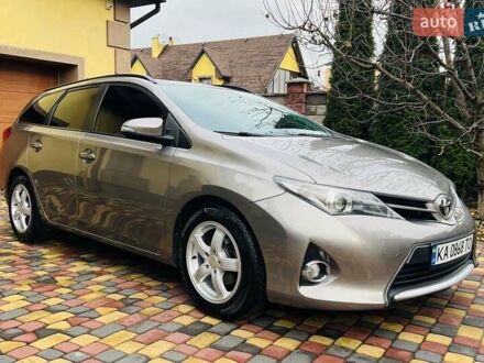 Коричневий Тойота Ауріс, об'ємом двигуна 1.36 л та пробігом 196 тис. км за 8999 $, фото 1 на Automoto.ua