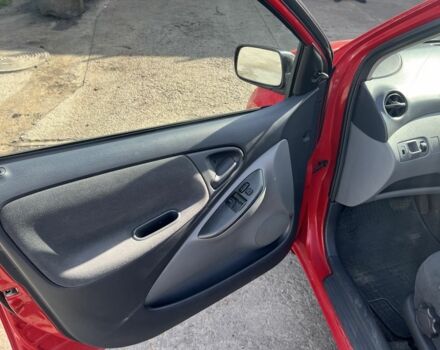 Червоний Тойота Ауріс, об'ємом двигуна 1.3 л та пробігом 245 тис. км за 4000 $, фото 5 на Automoto.ua