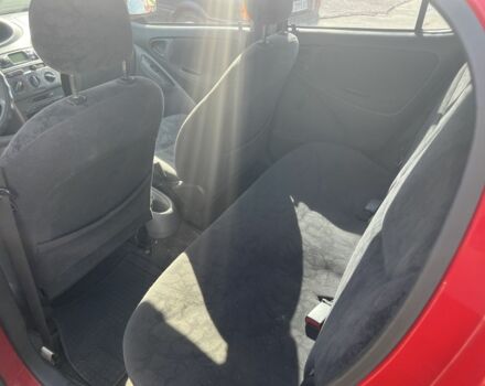 Червоний Тойота Ауріс, об'ємом двигуна 1.3 л та пробігом 245 тис. км за 4000 $, фото 7 на Automoto.ua