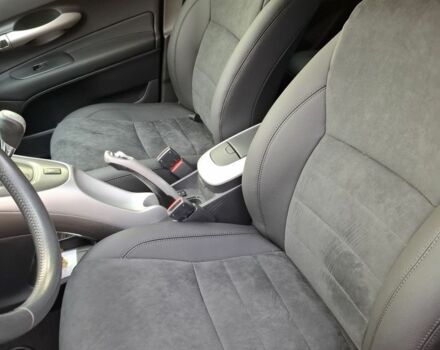 Красный Тойота Аурис, объемом двигателя 1.6 л и пробегом 196 тыс. км за 6800 $, фото 5 на Automoto.ua