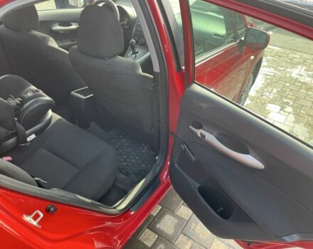 Красный Тойота Аурис, объемом двигателя 1.6 л и пробегом 182 тыс. км за 6300 $, фото 9 на Automoto.ua