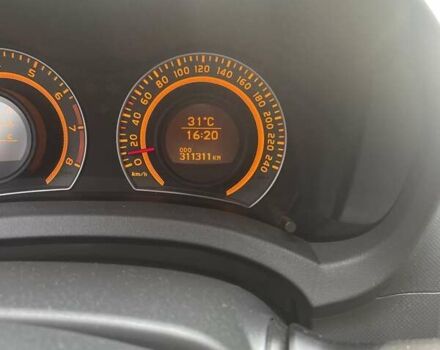 Красный Тойота Аурис, объемом двигателя 1.6 л и пробегом 313 тыс. км за 5300 $, фото 16 на Automoto.ua