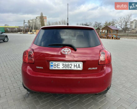 Красный Тойота Аурис, объемом двигателя 1.6 л и пробегом 193 тыс. км за 6855 $, фото 6 на Automoto.ua