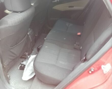 Красный Тойота Аурис, объемом двигателя 1.6 л и пробегом 130 тыс. км за 3300 $, фото 6 на Automoto.ua