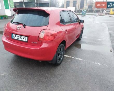 Червоний Тойота Ауріс, об'ємом двигуна 1.6 л та пробігом 243 тис. км за 6900 $, фото 3 на Automoto.ua
