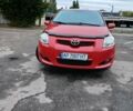 Красный Тойота Аурис, объемом двигателя 1.6 л и пробегом 125 тыс. км за 7999 $, фото 1 на Automoto.ua