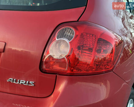 Червоний Тойота Ауріс, об'ємом двигуна 1.6 л та пробігом 85 тис. км за 8700 $, фото 25 на Automoto.ua