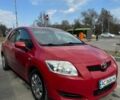Красный Тойота Аурис, объемом двигателя 1.6 л и пробегом 195 тыс. км за 8000 $, фото 1 на Automoto.ua