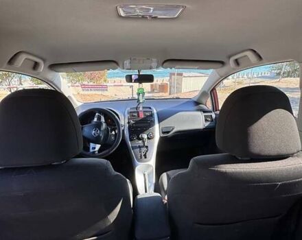 Червоний Тойота Ауріс, об'ємом двигуна 1.6 л та пробігом 219 тис. км за 9700 $, фото 12 на Automoto.ua