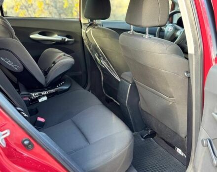 Червоний Тойота Ауріс, об'ємом двигуна 1.6 л та пробігом 122 тис. км за 10200 $, фото 9 на Automoto.ua