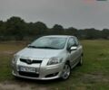Сірий Тойота Ауріс, об'ємом двигуна 2.23 л та пробігом 250 тис. км за 6199 $, фото 1 на Automoto.ua