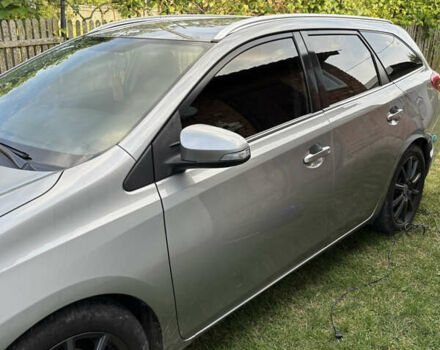 Сірий Тойота Ауріс, об'ємом двигуна 2 л та пробігом 225 тис. км за 11000 $, фото 5 на Automoto.ua