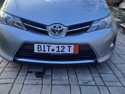 Сірий Тойота Ауріс, об'ємом двигуна 2 л та пробігом 255 тис. км за 12500 $, фото 1 на Automoto.ua