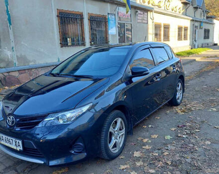 Синий Тойота Аурис, объемом двигателя 1.33 л и пробегом 154 тыс. км за 9299 $, фото 2 на Automoto.ua