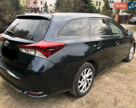 Зелений Тойота Ауріс, об'ємом двигуна 1.4 л та пробігом 203 тис. км за 13500 $, фото 5 на Automoto.ua