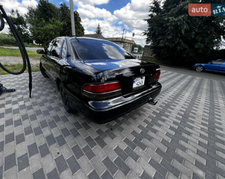 Черный Тойота Авалон, объемом двигателя 3 л и пробегом 311 тыс. км за 2700 $, фото 2 на Automoto.ua