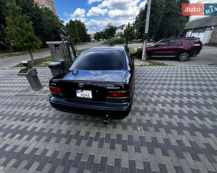 Черный Тойота Авалон, объемом двигателя 3 л и пробегом 311 тыс. км за 2700 $, фото 1 на Automoto.ua