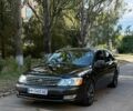Черный Тойота Авалон, объемом двигателя 3 л и пробегом 300 тыс. км за 5000 $, фото 1 на Automoto.ua