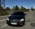 Черный Тойота Авалон, объемом двигателя 3.5 л и пробегом 340 тыс. км за 7528 $, фото 1 на Automoto.ua