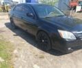 Черный Тойота Авалон, объемом двигателя 3.5 л и пробегом 245 тыс. км за 10500 $, фото 1 на Automoto.ua